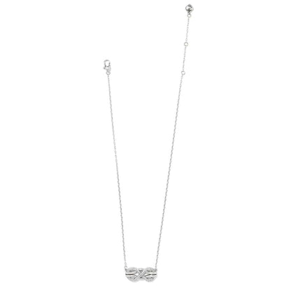 Brighton silver-plated necklace with crystal-accented infinity knot pendant and lobster clasp on a white background