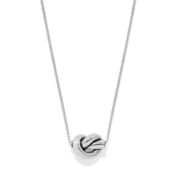 Brighton pendant necklace with silver-plated knot charm on a delicate chain on a white background