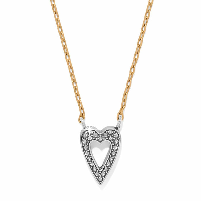 Brighton pendant necklace with silver-tone crystal heart on a gold-tone chain on a white background