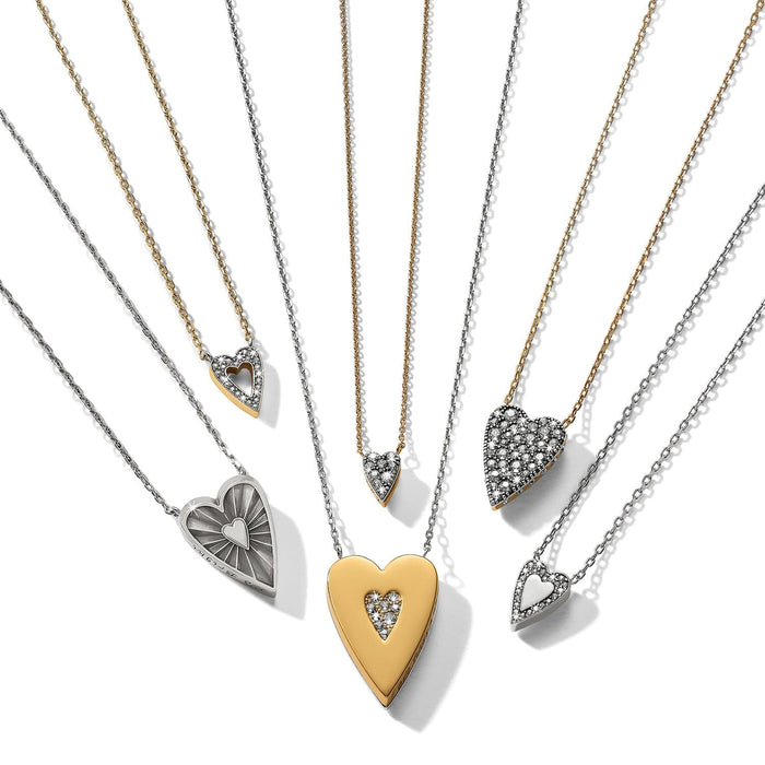 Brighton heart pendant necklaces in two-tone finish with crystal accents in various sizes on a white background