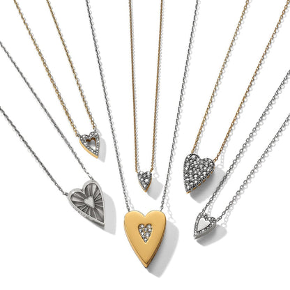 Brighton heart pendant necklaces in two-tone finish with crystal accents in various sizes on a white background