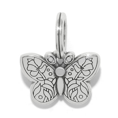 Brighton butterfly charm with silver-plated finish and engraved floral wing detail on a white background
