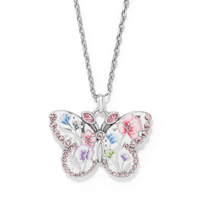 Brighton butterfly pendant necklace with pink crystals, enamel floral details, and silver-plated chain on a white background