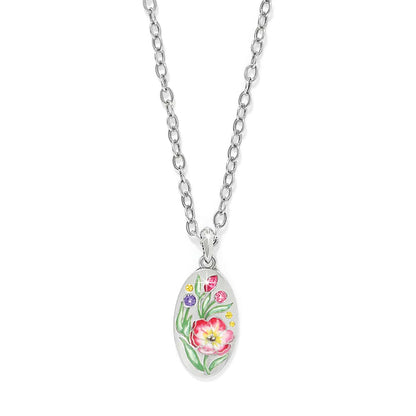 Brighton pendant necklace with silver-plated oval featuring enamel floral design and colorful crystal accents on a white background