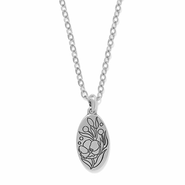 Brighton pendant necklace with silver-plated oval charm featuring engraved floral design and cable chain on a white background