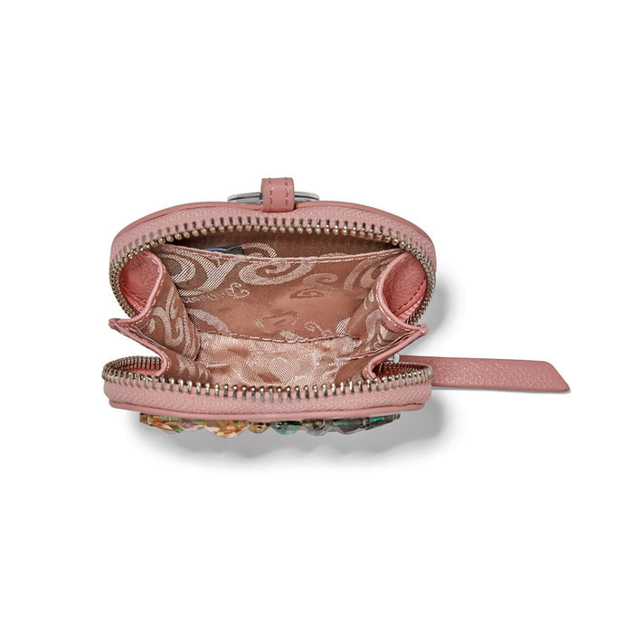 Brighton pink leather coin pouch shown open with patterned fabric lining and zipper closure on a white background