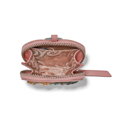Brighton pink leather coin pouch shown open with patterned fabric lining and zipper closure on a white background