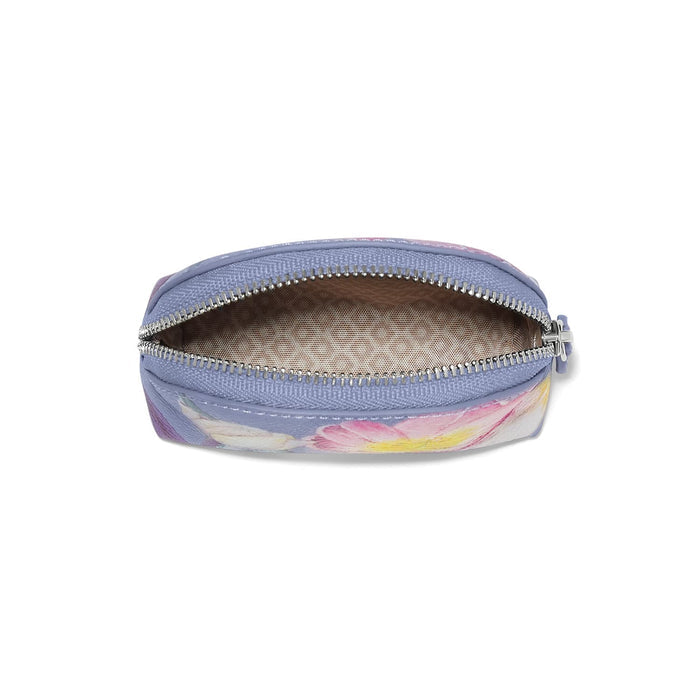 Brighton pouch shown open with floral print exterior, periwinkle zipper, and beige interior lining on a white background