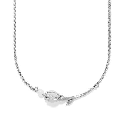 Brighton silver-plated necklace with tulip flower pendant and small white bead accent on a white background