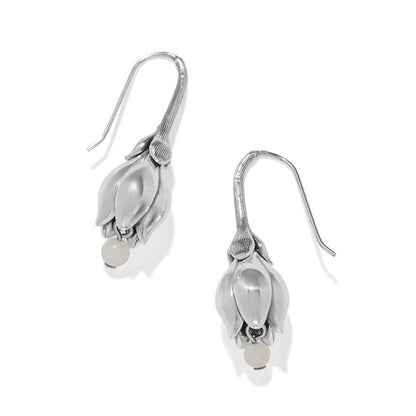 Brighton drop earrings with silver-plated tulip-shaped flower buds and small white beads on a white background