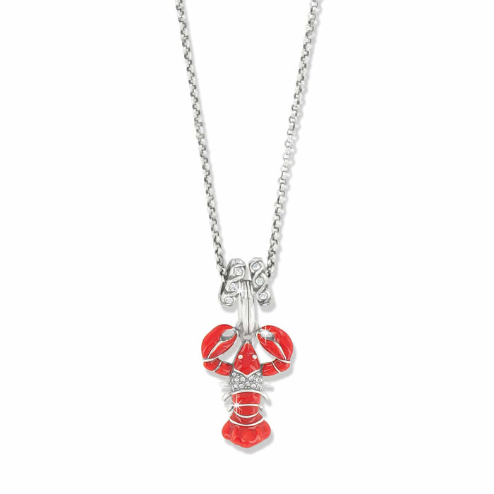Brighton pendant necklace with red enamel lobster charm, crystal accents, and silver-plated chain on a white background