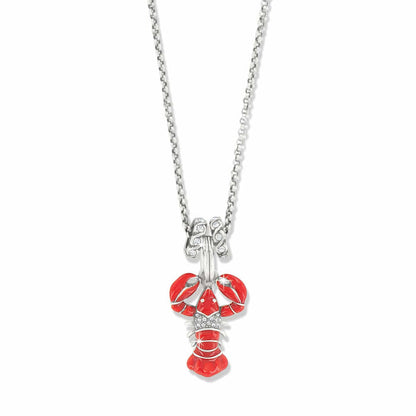 Brighton pendant necklace with red enamel lobster charm, crystal accents, and silver-plated chain on a white background