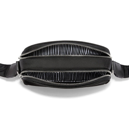 Close-up of Brighton black nylon belt bag shown open with silver-tone zippers and striped interior lining
