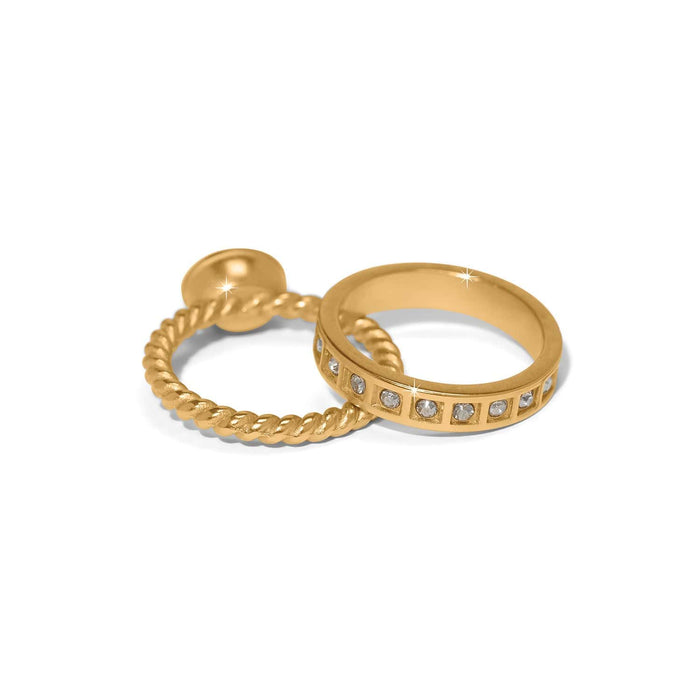 Brighton gold-plated ring set with twisted rope band and crystal-accented eternity band on a white background