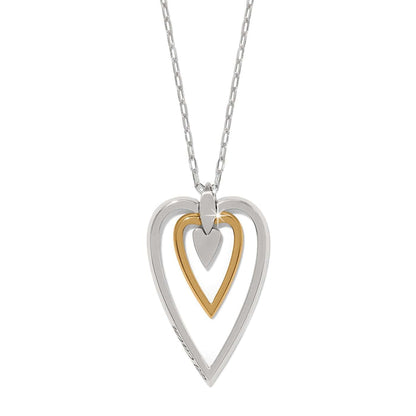Brighton pendant necklace with two-tone silver and gold layered open heart design on a white background