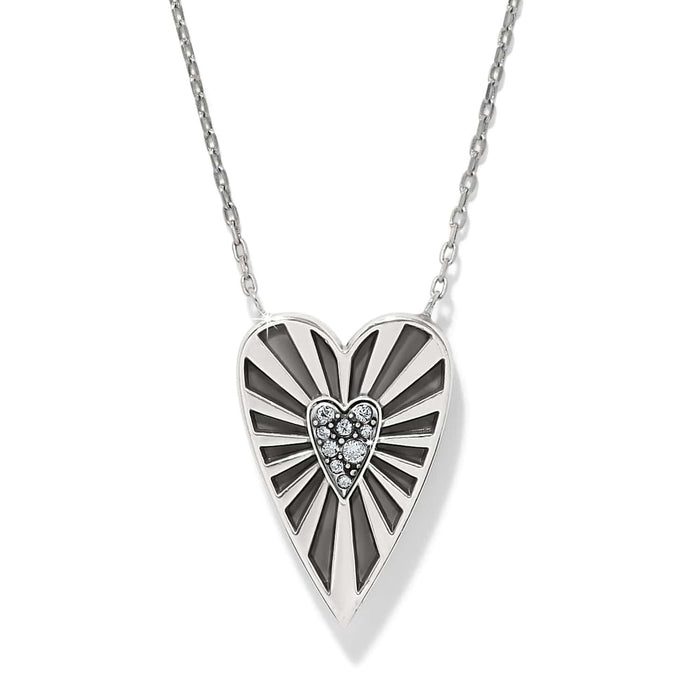 Brighton heart pendant necklace with silver-plated rays, black accents, and crystal center heart on a white background