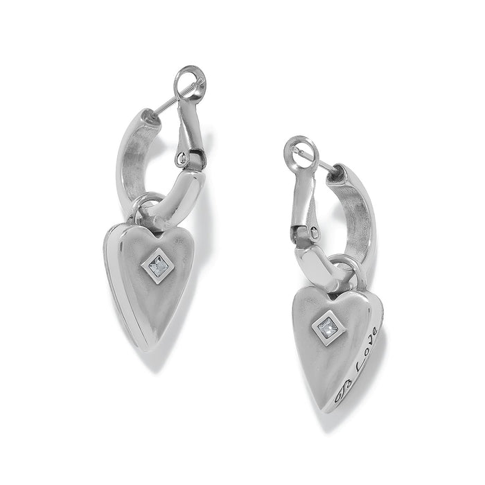 Brighton hoop earrings with silver-plated heart charms, crystal accents, and engraved love detail on a white background
