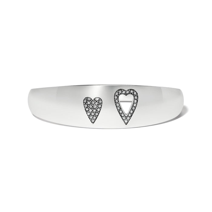 Brighton silver-plated bangle bracelet with two heart motifs and crystal accents on a white background