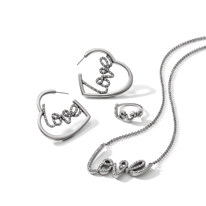 Brighton silver-plated jewelry set styled with heart hoop earrings, love ring, and matching love script necklace with crystals