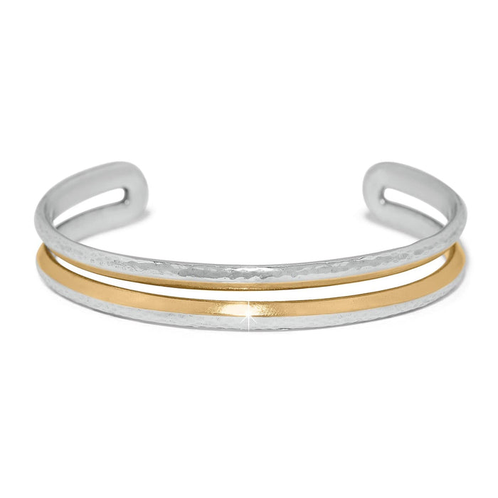 Brighton cuff bracelet with hammered silver-tone outer band and smooth gold-tone inner band on a white background
