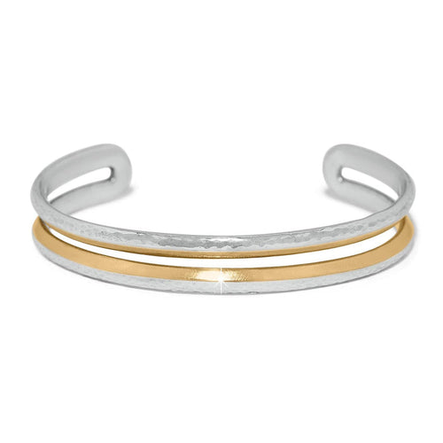 Brighton cuff bracelet with hammered silver-tone outer band and smooth gold-tone inner band on a white background