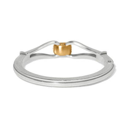 Brighton ring shown from the back with silver-plated band and gold-plated center accent on a white background