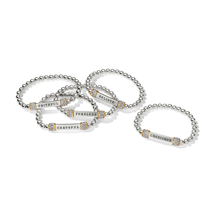 Brighton beaded stretch bracelets with two-tone bars reading Faithful, Fearless, Grateful, Believe, Cherished and crystal accents on a white background