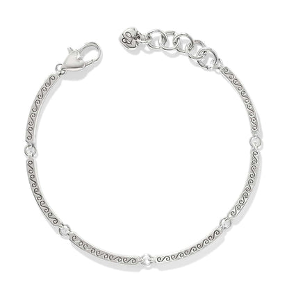 Brighton silver-plated link bracelet with engraved wave scroll bar links and lobster clasp on a white background