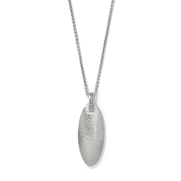 Brighton pendant necklace with hammered silver-plated oval drop and crystal-accented bail on a white background