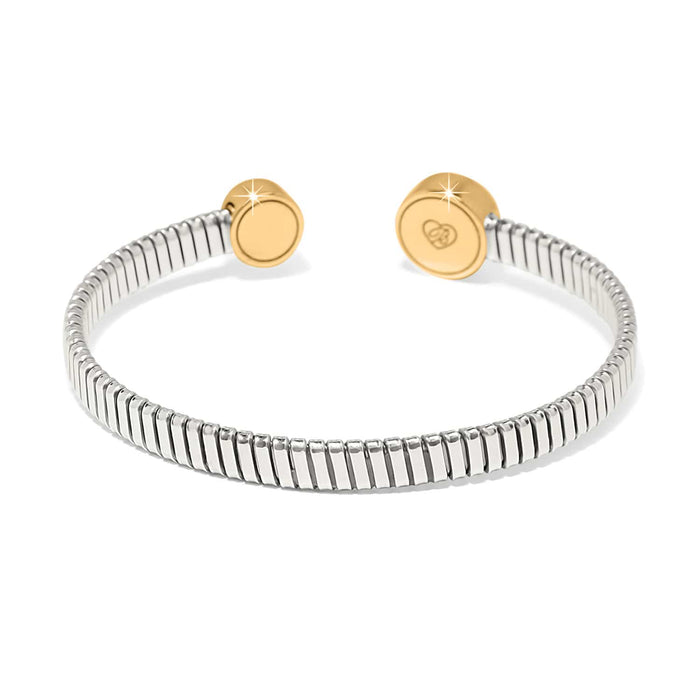 Brighton cuff bracelet with silver-plated ribbed band and gold-plated round end caps on a white background