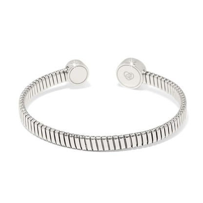 Brighton cuff bracelet with ribbed silver-plated band and round engraved logo end caps on a white background