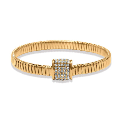 Brighton bracelet with gold-plated ribbed stretch band and crystal pavé centerpiece bead on a white background