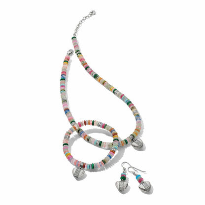 Brighton beaded necklace, bracelet, and heart drop earrings set with multicolored gemstone beads and silver-plated accents on a white background