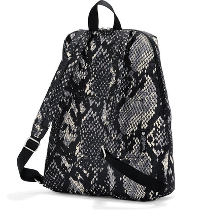 Brighton backpack shown from the back with black and cream snakeskin print and adjustable straps on a white background