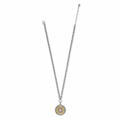 Brighton pendant necklace with two-tone star medallion, crystal accents, and silver-tone chain on a white background