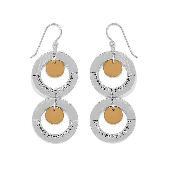 Brighton drop earrings with two-tone double silver hoops and gold-tone discs with engraved details on a white background