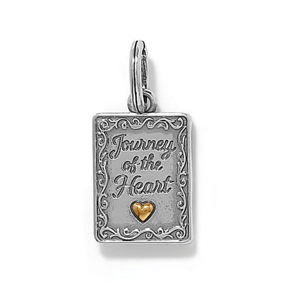 Brighton rectangular charm engraved with Journey of the Heart, scroll border, and gold-tone heart accent on a white background