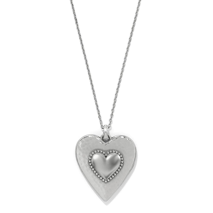 Brighton heart pendant necklace with silver-plated hammered finish and beaded center heart on a white background