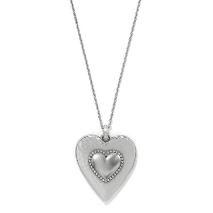 Brighton pendant necklace with silver-plated hammered heart and beaded smaller heart accent on a white background