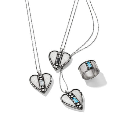 Brighton silver-plated heart pendant necklaces and ring with crystal accents styled together on a white background