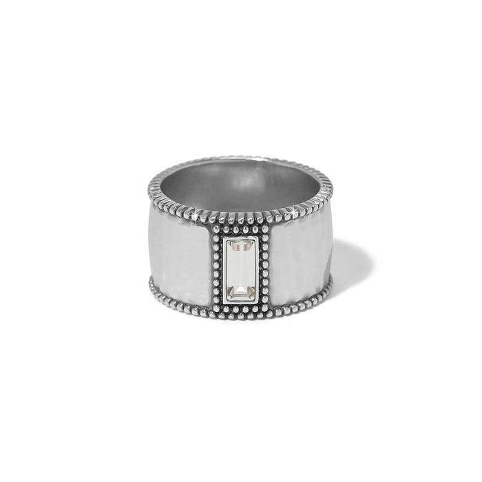 Brighton silver-plated wide band ring with hammered finish, beaded edges, and crystal baguette accent on a white background