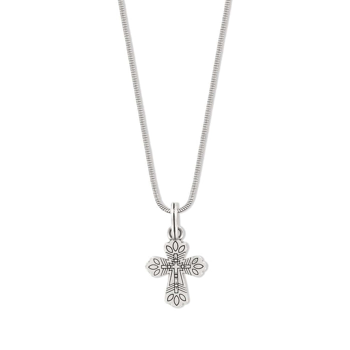 Brighton pendant necklace with silver-plated cross featuring engraved details on a snake chain on a white background