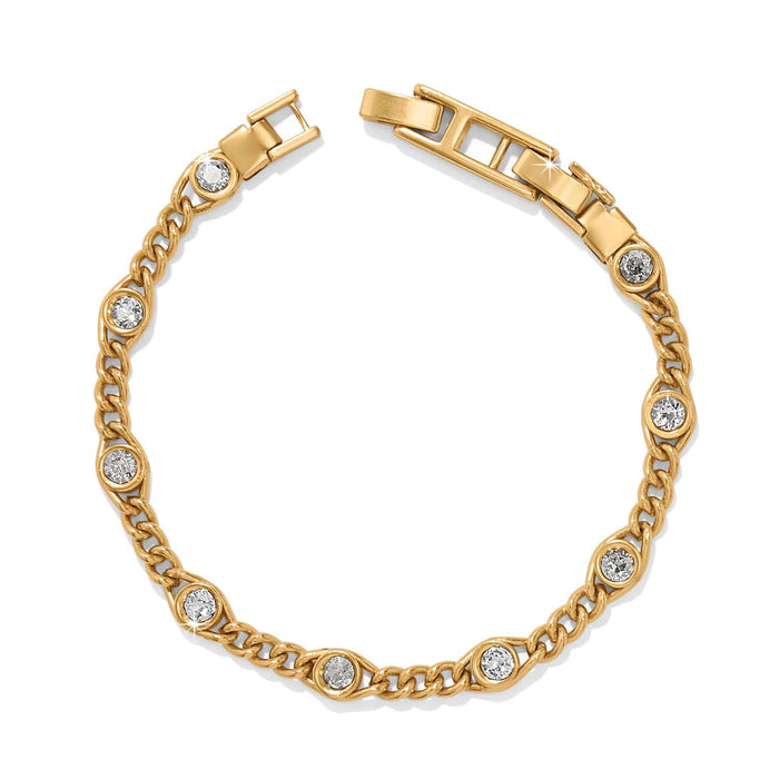 Brighton bracelet with gold-plated curb chain links and round crystal stations on a white background