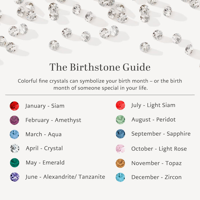 Brighton birthstone guide chart styled with scattered crystals, listing twelve months paired with corresponding colored crystal stones