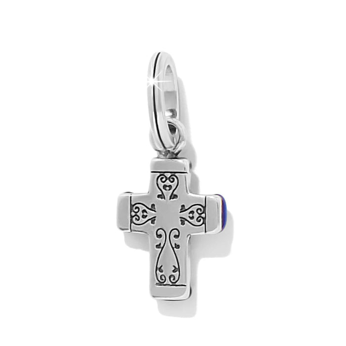 Brighton cross charm with silver-tone scrollwork engraving and split ring attachment on a white background