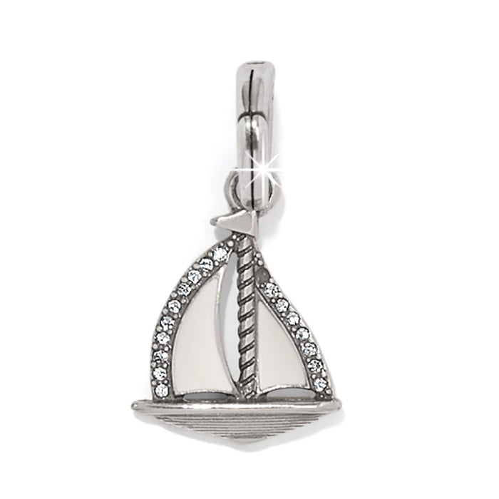 Brighton sailboat charm with silver-plated finish, white enamel sails, and crystal accents on a white background